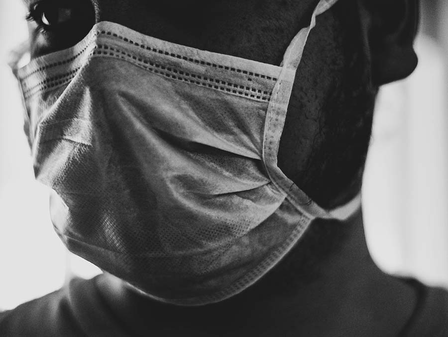 Up-close image of a person wearing a face mask