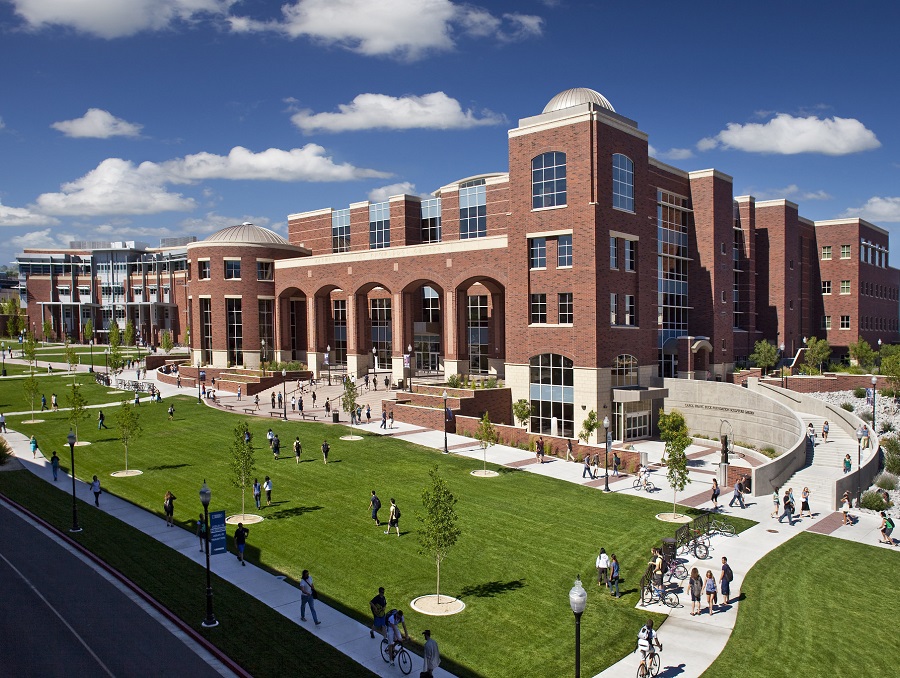 The Mathewson-IGT Knowledge Center and Joe Crowley Student Union buildings with people walking 