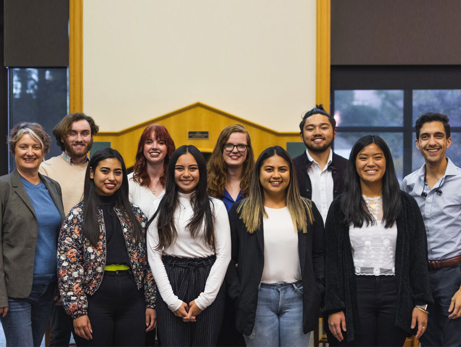 The PRSSA board members pose in the Linn Reading Room of the Reynolds School of Journalism