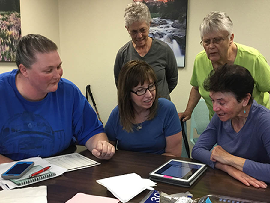 In a Not Alone Aphasia Communication Group, aphasia participants practice communication using multiple platforms.