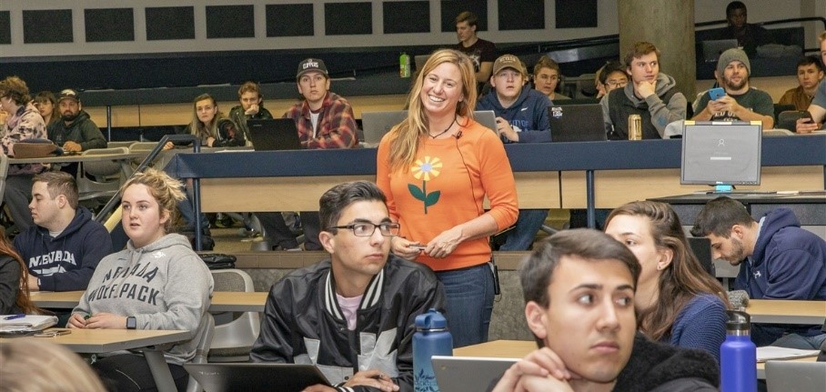 A photo of Ann Marie Vollstedt in a lecture hall.