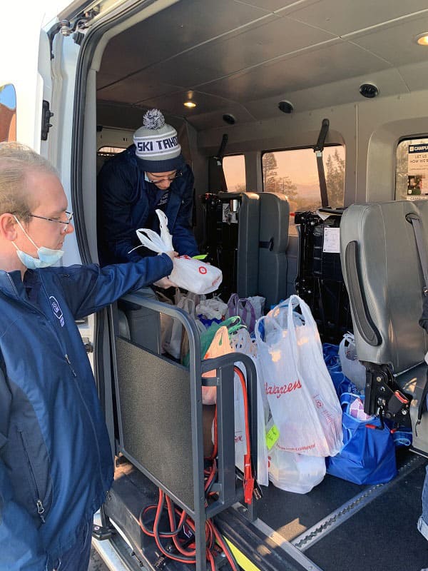 Groceries packed in the Campus Escort van for delivery