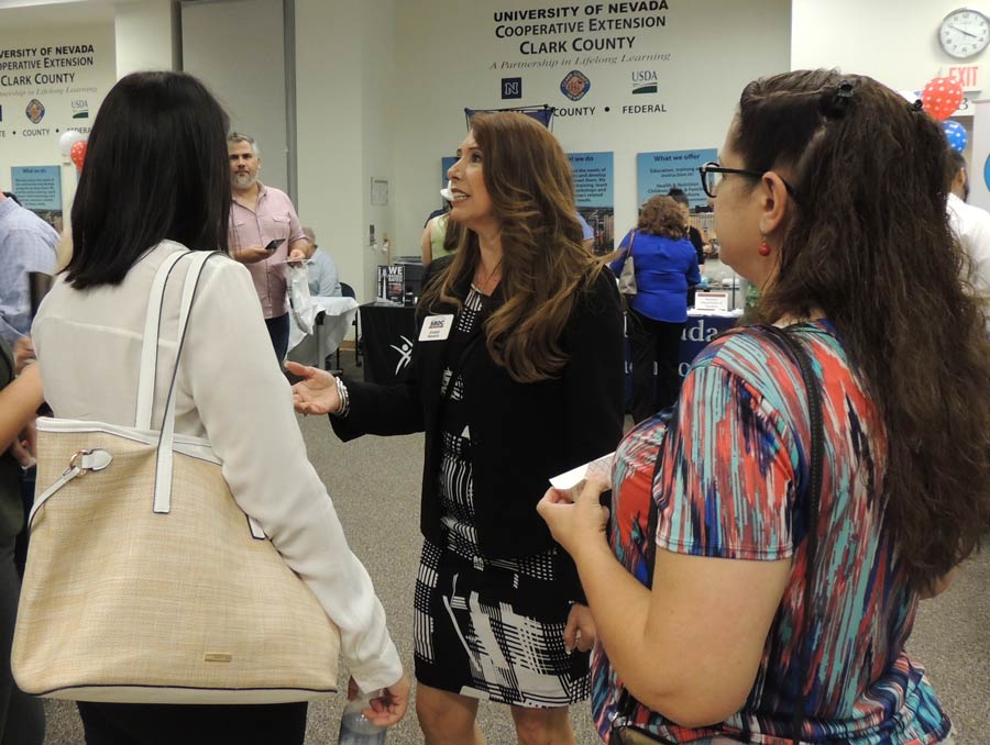 Businesswoman presenting at an Extension business development event