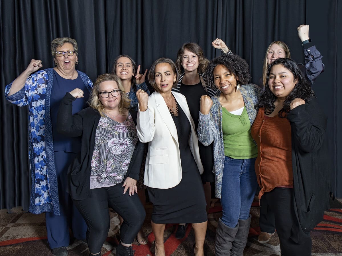 Some of the founding members of the School of Social Work Alumni Chapter pose with Dean Shadi Martin and Community Advisory Board Chair Rota Rosaschi. 