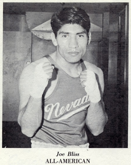 Joe Bliss in a boxing stance with taped hands and the words "Joe Bliss All American" below him