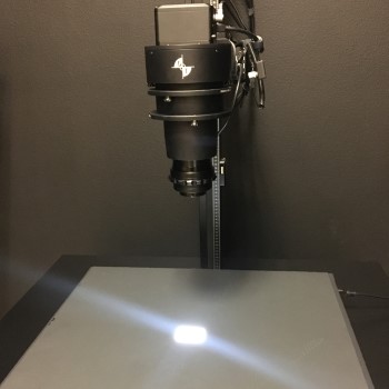 The camera and lightbox used to capture the rock thin sections. 