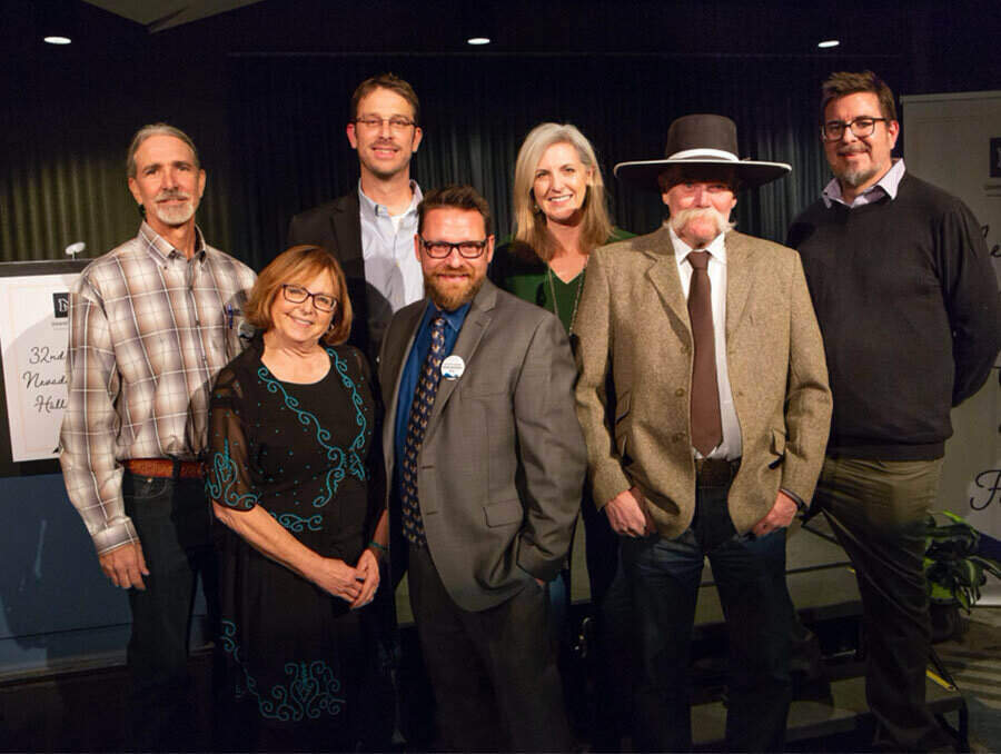 Past Nevada Writers Hall of Fame honorees gather for a group picture (from left, back row, Michael Branch, Lindsay Wilson, Alicia Barber, Christopher Coake, from left, front row, Terri Farley, Mark Maynard and Waddie Mitchell)