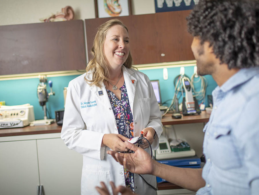 A photo of a doctor discussing health care with a patient.