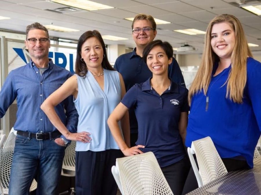 Photo of Jim Sacherman, the center's first director, current Director Grace Chou, Makerspace Specialist Daniel Smith, Assistant Director Crystal Harvey and Office Coordinator Ania Cavillo-Mason.