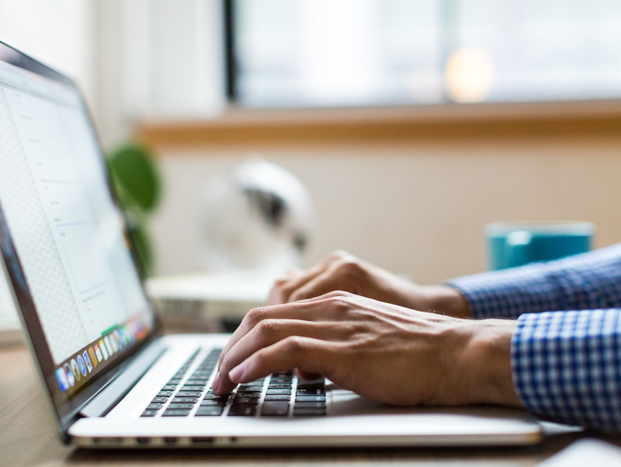 A person working on their laptop