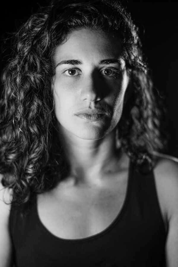 Luiza Vieira black and white headshot.