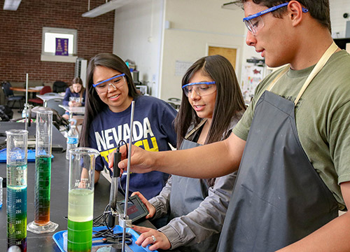 Nevada Teach students working on a science project in the classroom