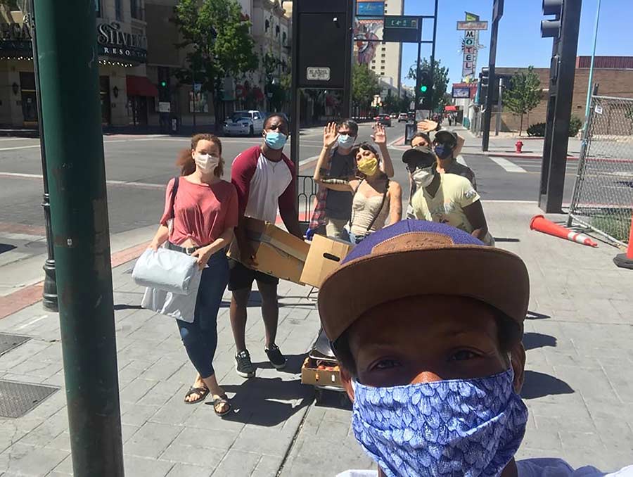 Blaize and his team handing out burritos downtown 