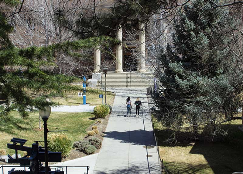 Students walking toward Palmer Engineering building