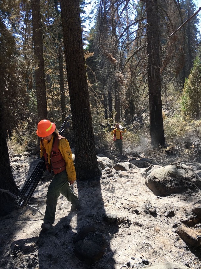 Laura Wade and Rodney Hart climb a ridge after using Terrestrial Laser Scanning to survey the ridge after the Ferguson Fire (2018) passed through. Photo by William Scharffenberger.