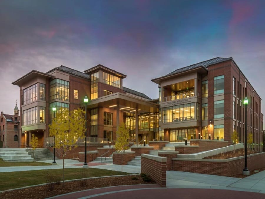 The Pennington Student Achievement Center at dusk with colorful clouds