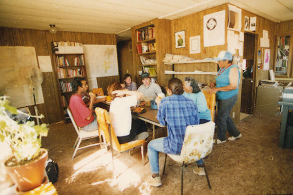 Western Shoshone Defense Project staff meeting around table at project headquarters