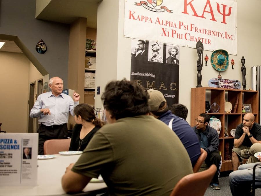 Mick Hitchcock addresses students in The Center located in the University's Joe Crowley Student Union.