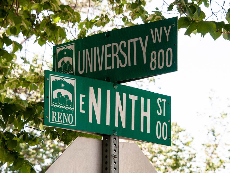 Street signs that read University Way and Ninth Street