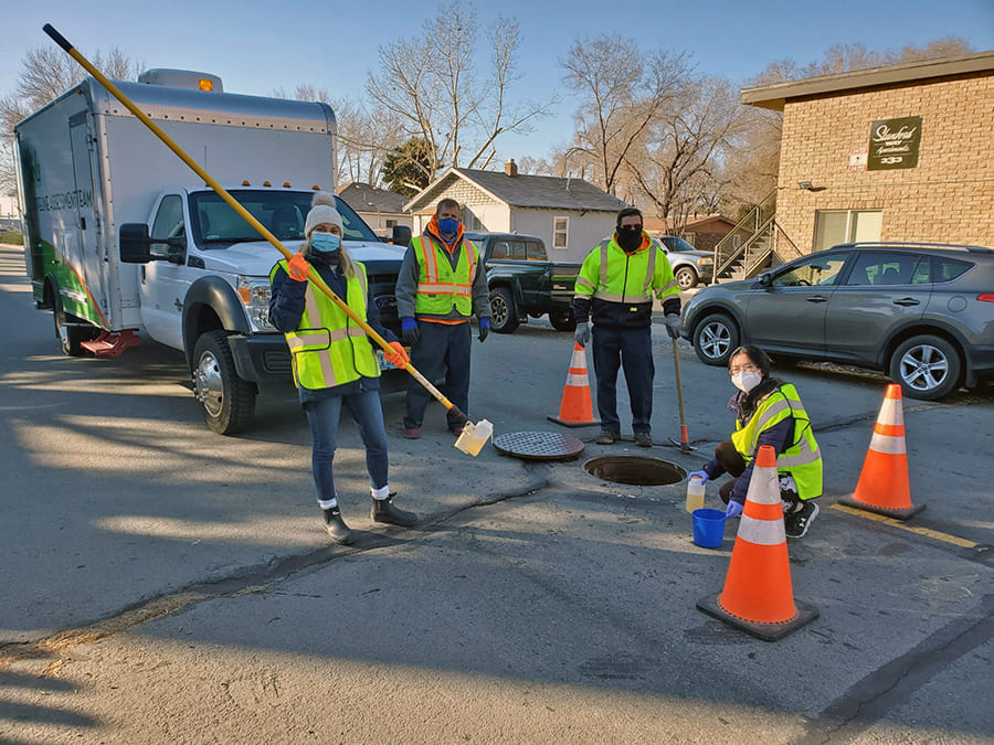 gathering wastewater samples