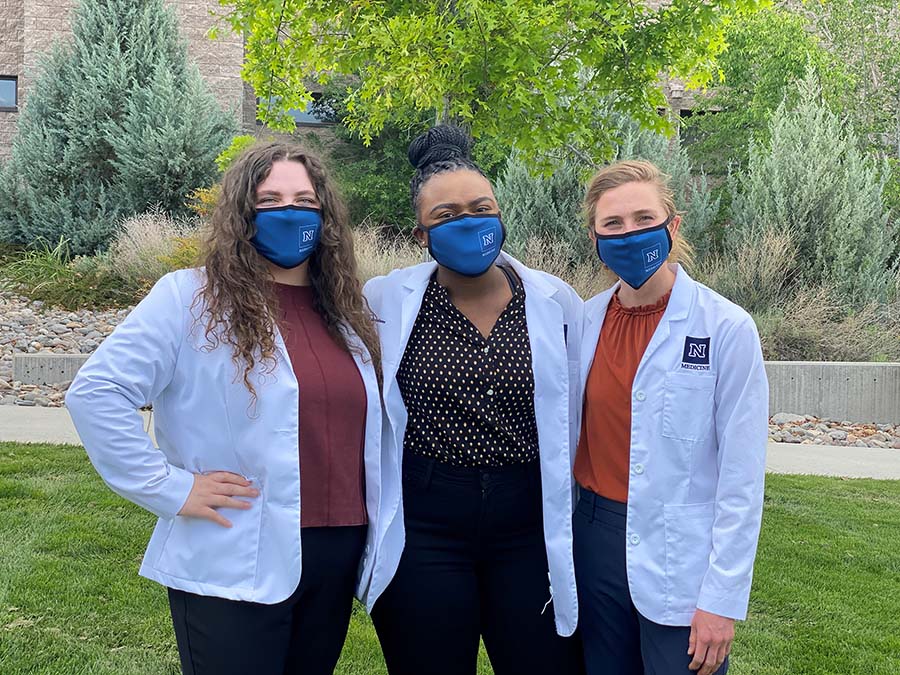 From left to right, University of Nevada, Reno School of Medicine students Haley Nadone, Mirabel Dafinone and Audrey Adler.