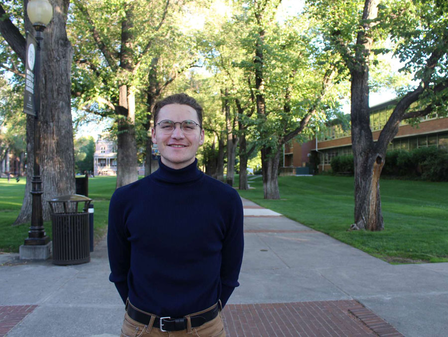 Jacob Molina poses for a photo at the quad.