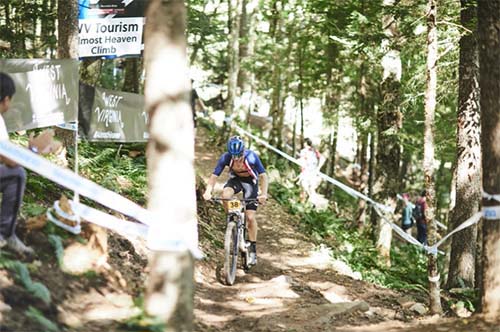 Luke Miers rides his mountain bike on a trail