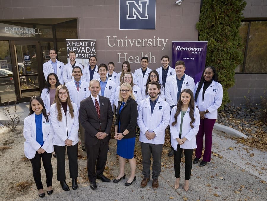 A group of UNR Med first-year and third-year medical students and second-year physician assistant studies program students, who are among the first 25 recipients of the Renown Health Scholarship, appear with Renown Health President & CEO, Dr. Anthony Slonim, and UNR Med Acting Dean and Chief Academic Officer at Renown Health, Dr. Melissa Piasecki