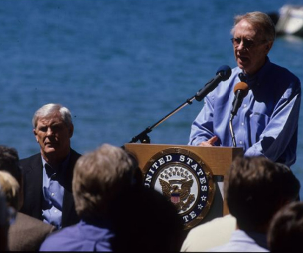 Photograph of Harry Reid presenting outside at the Lake Tahoe Summit in 2001