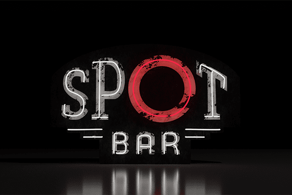 A neon sign that says Spot Bar in white and red light in front of a black background.