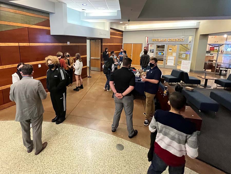 People gather and talk in the lobby of the Joe Crowley Student Union on the University of Nevada, Reno campus.