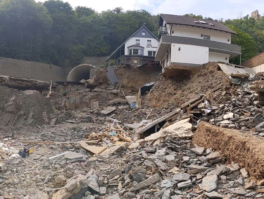 House and building debris from flooding in Europe