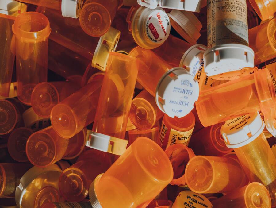 A pile of empty medication bottles