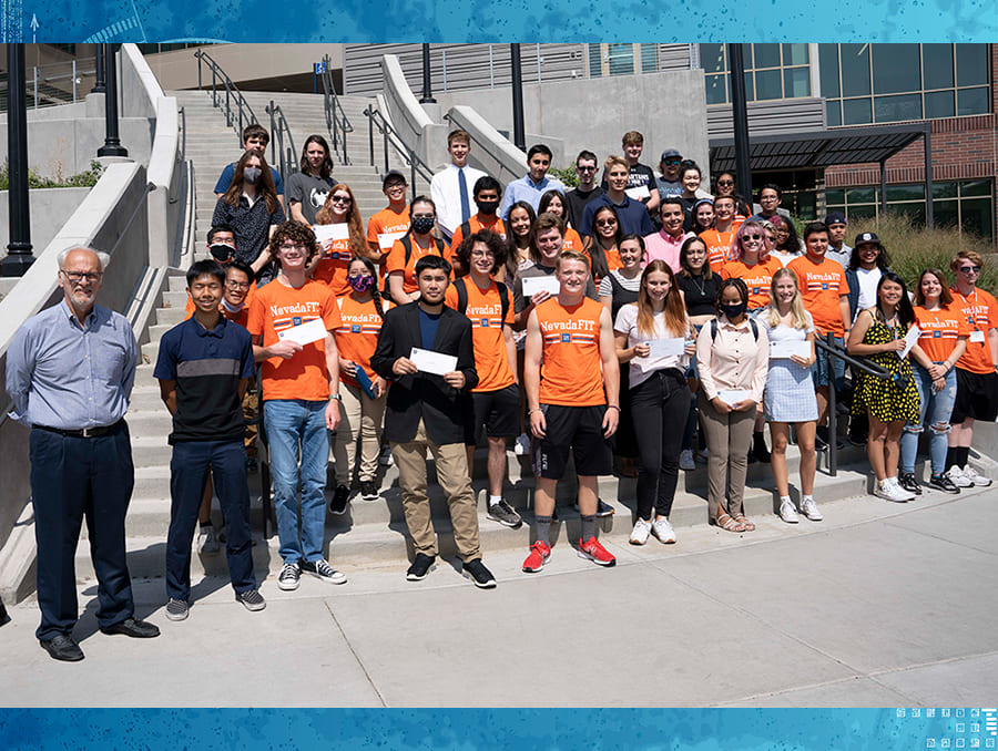 Engineering dean and students gathered on the steps of the William N. Pennington Engineering Building