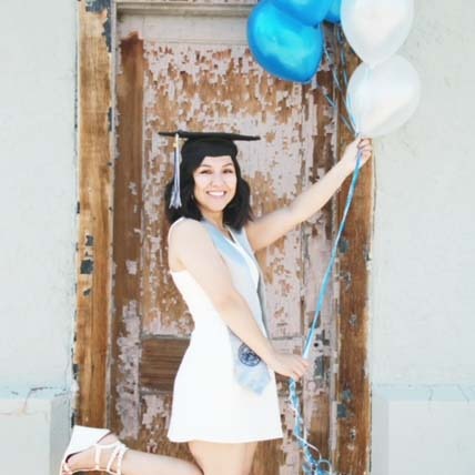 Jennifer Burton holding balloons