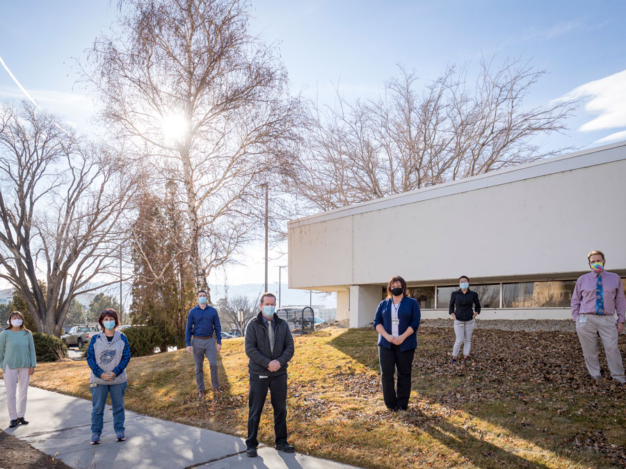 Mark Pandori outside of the lab with other staff.