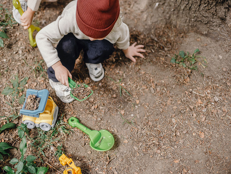 A child digging in the dirt