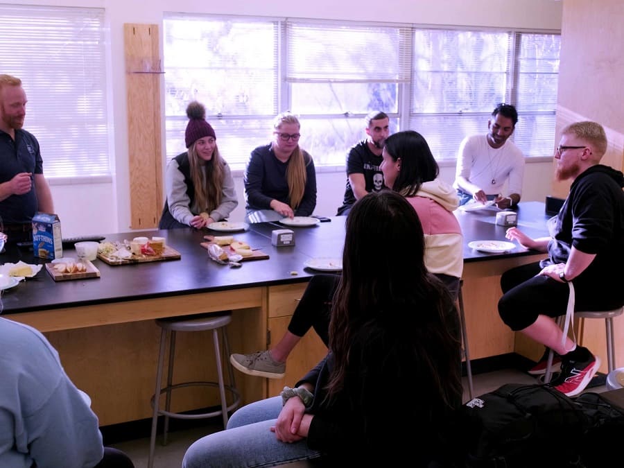 Assistant Professor Steven Frese runs a hands-on and delicious cheese lab with students in the updated space.
