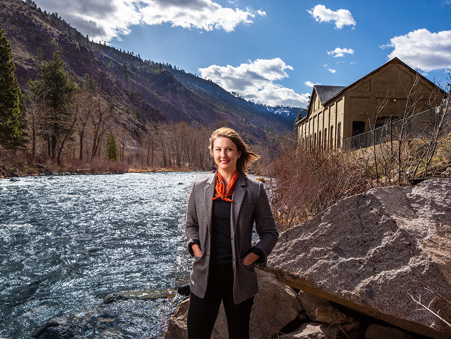 Elizabeth Koebele stands next to Truckee River