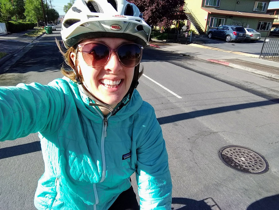 Joanna Trieger takes a selfie on a bike