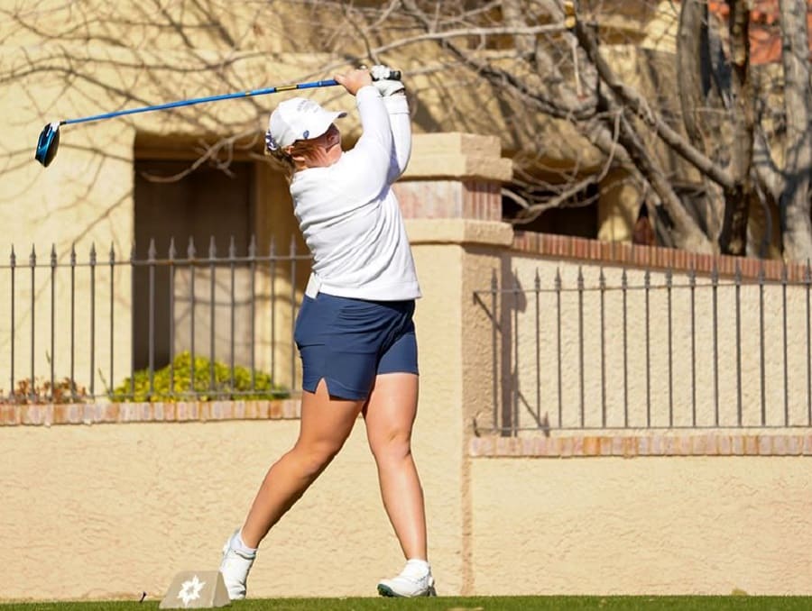 Victoria Gailey driving a golf ball at the Wyoming Cowgirl Classic