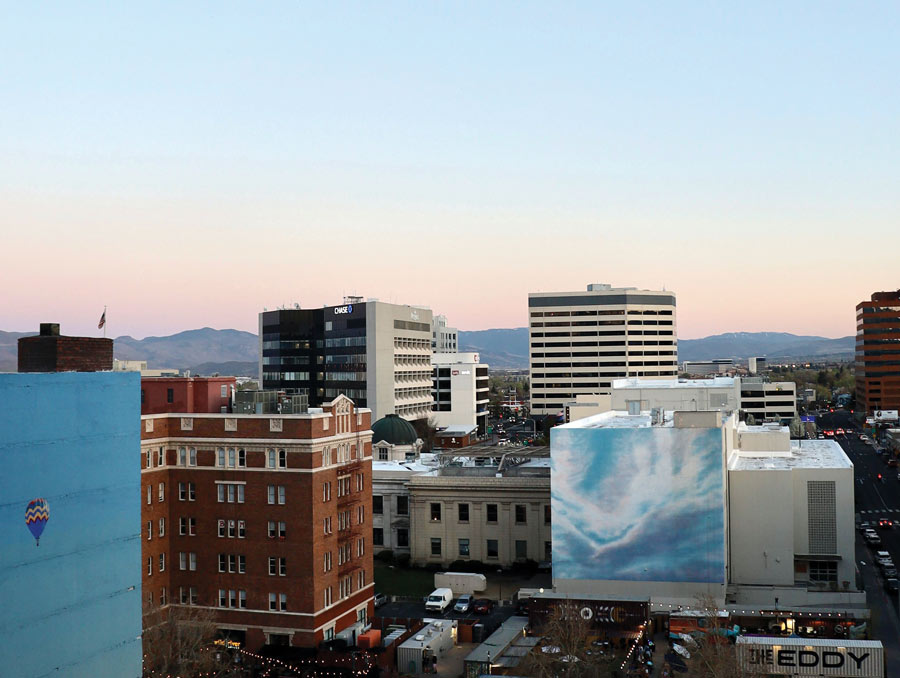 A photo of downtown Reno facing south with a clear sunset.