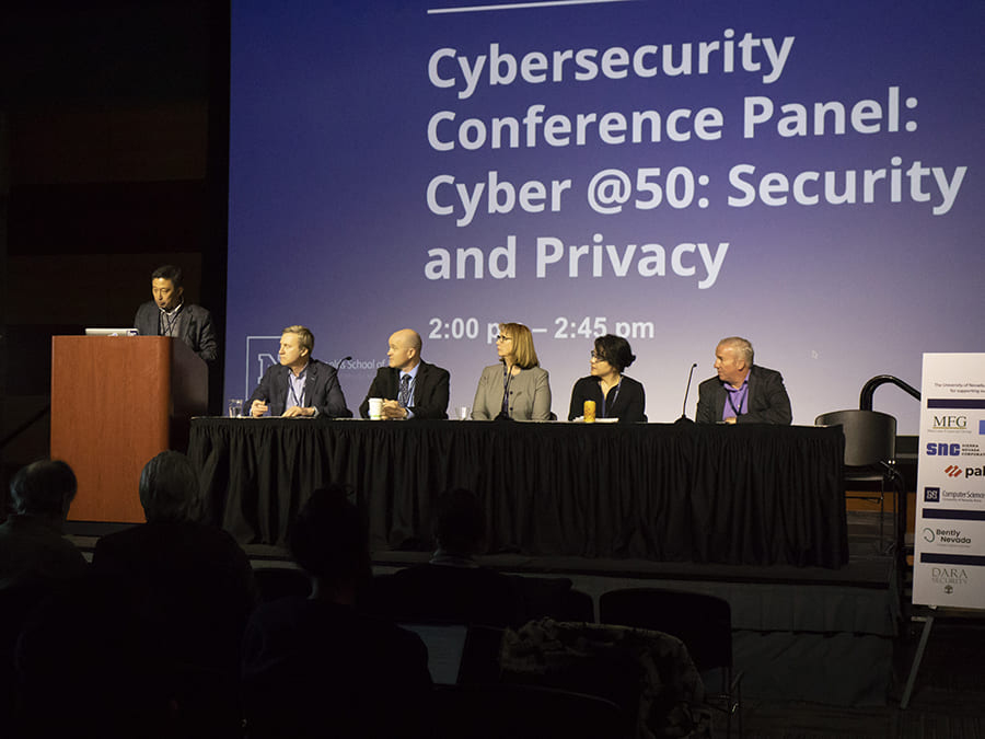 panel of experts at cybersecurity conference