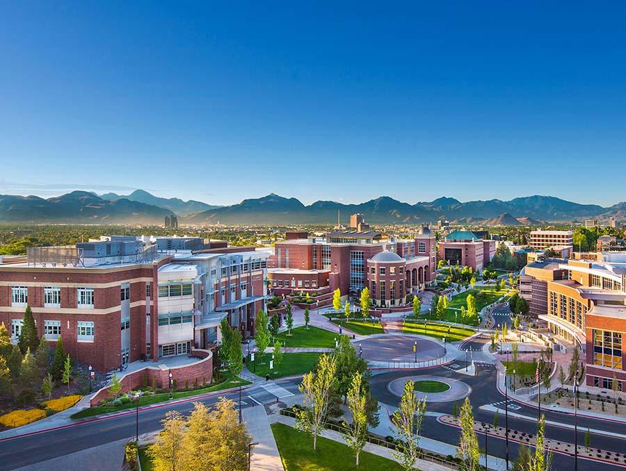 An aerial view of the University of Nevada, Reno campus with the Joe Crowley Student Union and the E. L. Wiegand Fitness Center in focus. 