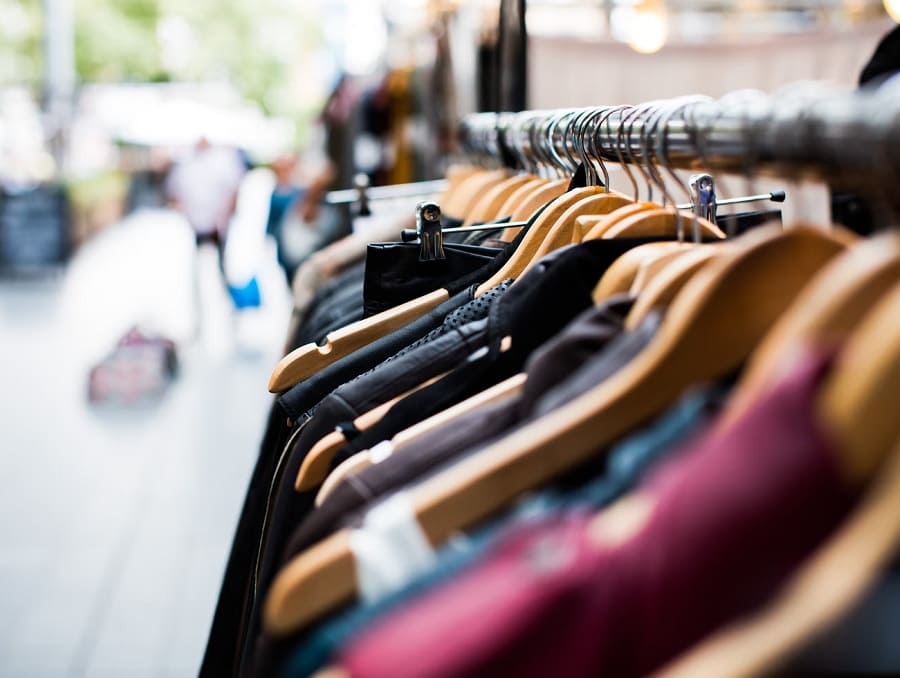 A rack of clothing set up outside