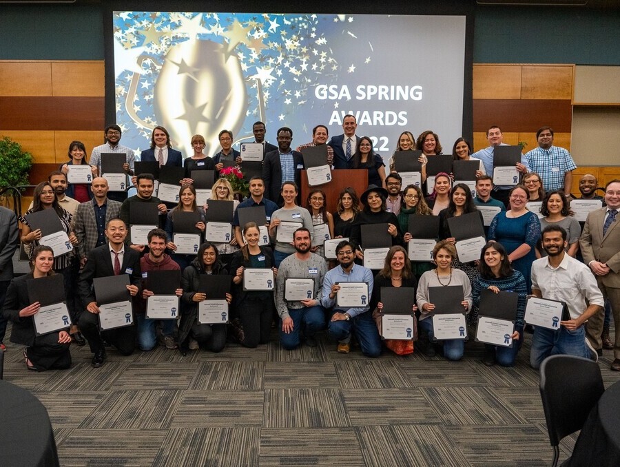 GSA spring awards winners pose in the Joe Crowley Student Union ballroom.