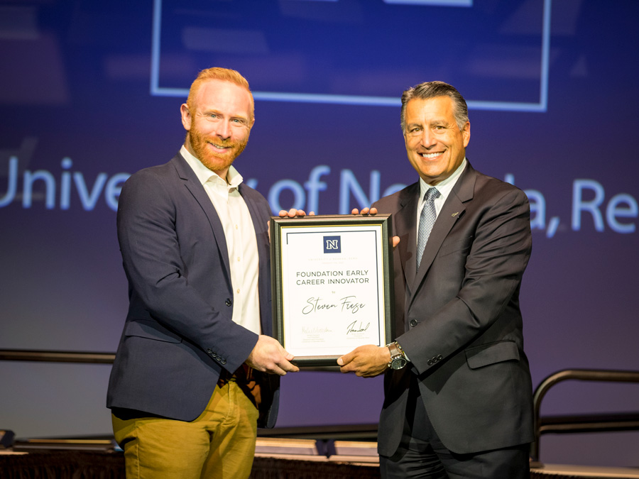 Steven receiving his Regents' award.