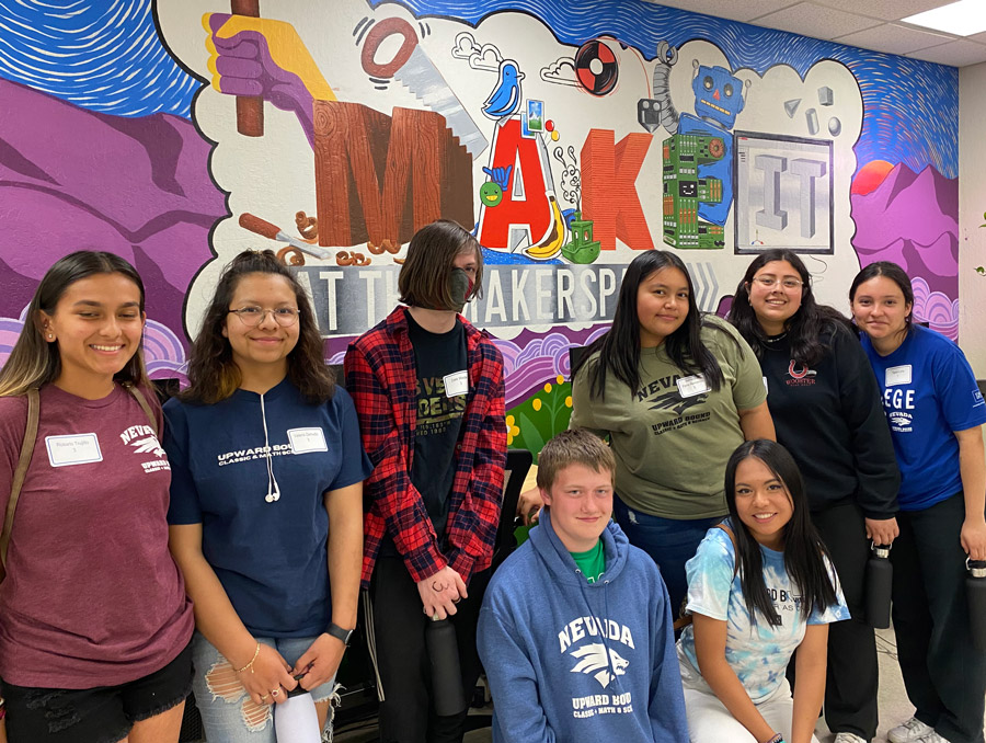 Students pose for picture while touring the Innevation Center Makerspace.