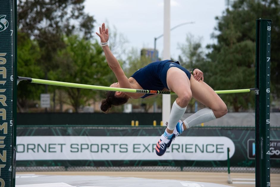 Nicola Ader performing a high jump