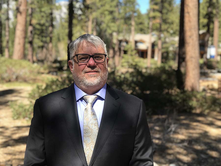 Douglas Boyle poses for a photo on the Sierra Nevada University campus.